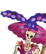 Catrina fumando rosa